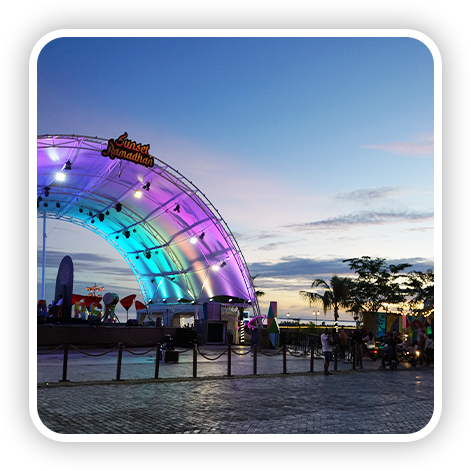Beach event stage with colorful lights